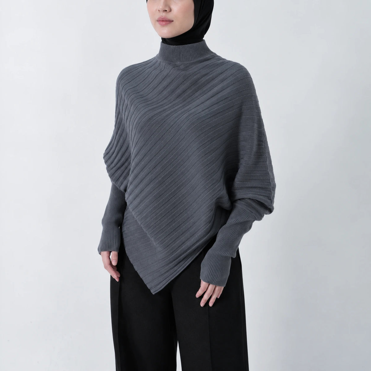 Poncho oversize en maille - asymétrique