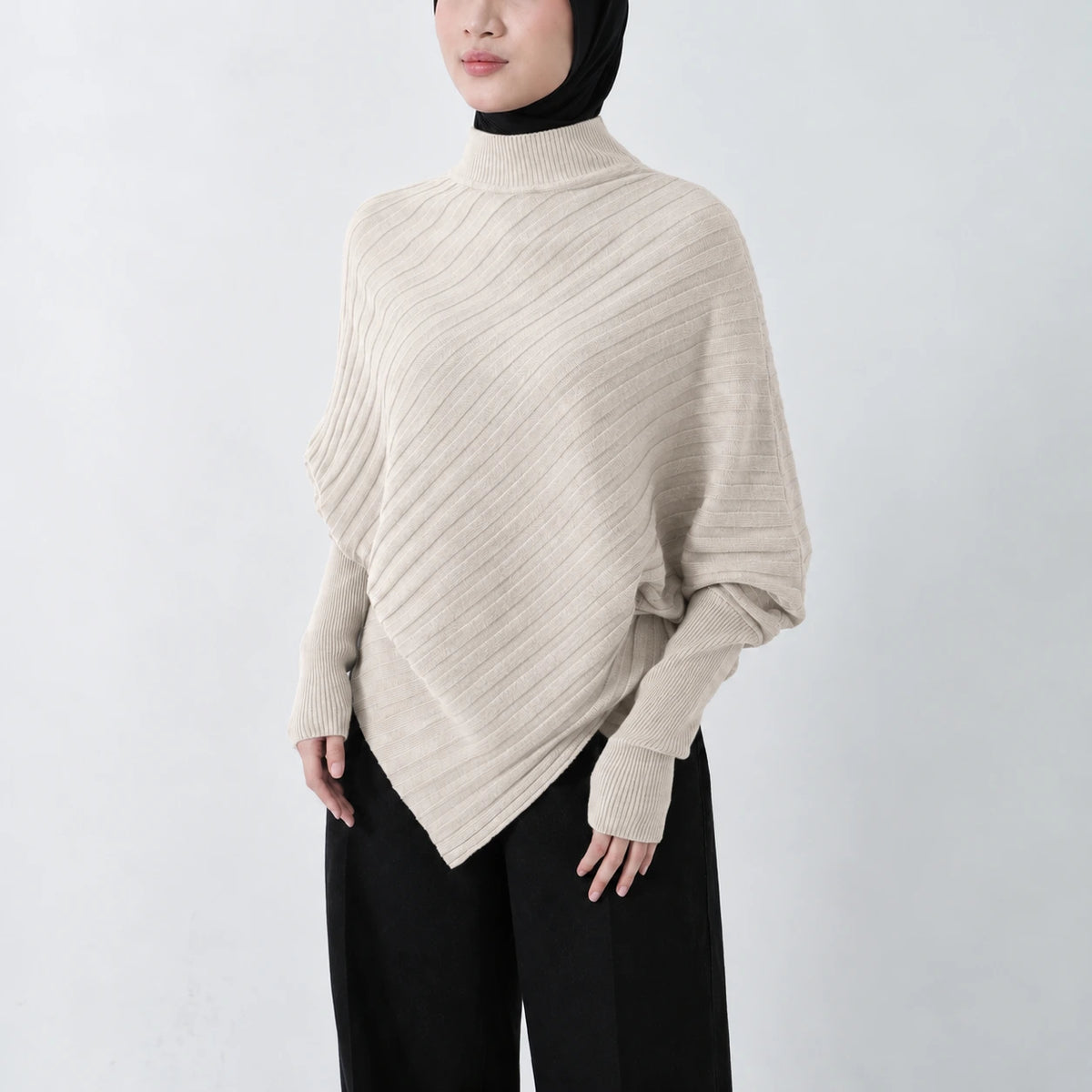 Poncho oversize en maille - asymétrique